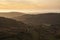 Lovely Winter landscape view from Red Screeds across misty layers of mountains towards the East