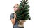 Lovely woman holding a christmastree