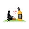 Lover alcohol drink. Man and bottle of whiskey on picnic. blanket and basket for food on lawn. Romantic date. Alcoholic Lifestyle