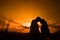 Lover couple in sunset background