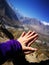 Lover hands touching and togethering with mountain and blue sky background for love and healing concept