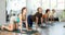 Lovers of active lifestyle on yoga mat perform doing Marjariasana, cat pose in gym