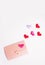 Lovers envelope with colorful hearts. Valentine's Day 2021 message. 14 February greeting card. Pink pastel envelope on