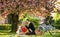 Lovers sensual kissing. Couple in love picnic date. Spring weekend. My treasure. Romantic proposal. Enjoying their
