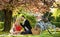 Lovers sensual kissing. My treasure. Romantic proposal. Enjoying their perfect date. Couple relaxing in park with