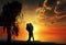 Lovers silhouette at sunset, orange sky, nature landscape