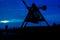 Lovers standing at the Prague Metronome at night