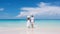 Lovers walk along the seashore. selective focus. Generative AI,