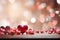 Loves ambiance, pink and red hearts on a light defocused wooden surface