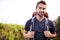 He loves his solitary hikes. a young man enjoying a hike through the mountains.