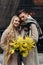 lovestory couple Love coat beige gray white bouquet of flowers tenderness feelings walk Hug date