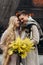 lovestory couple Love coat beige gray white bouquet of flowers tenderness feelings walk Hug date