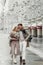 lovestory couple Love coat beige gray white bouquet of flowers tenderness feelings walk Hug date