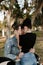 Loving Adorable Portrait of two Attractive Good Looking Young Adult Modern Fashionable People Guy Girl Couple Kissing and Hugging