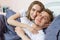 Loving beautiful couple in bed in the morning, loving family - heterosexual couple