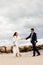 Loving bride and groom near the sea.