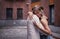 Loving Couple Embraces on the Sity Street. Sensual Lovers Husband and Wife Outdoors. Close-up Portrait