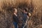 Loving couple in the field. Sunset