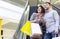 Loving couple having after shopping coffee in mall