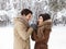 Loving Couple Holding Hands Standing Having Romantic Winter Date Outside