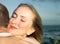 Loving couple hugging with focus on woman\'s face