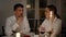 Loving couple talking at romantic home evening closeup. Lovers enjoying dinner