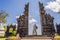 Loving couple of tourists in budhist temple Brahma Vihara Arama Banjar Bali, Indonesia. Honeymoon