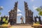 Loving couple of tourists in budhist temple Brahma Vihara Arama Banjar Bali, Indonesia. Honeymoon