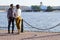 The loving couple walk on embankment of a river `Neva`.