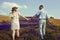 A loving couple is walking along the lavender field, a girl in a dress and a straw hat with a man holds hands and walks through