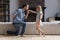 Loving father kneel kiss little daughter hand