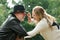 Loving father smiling together with daughter outdoors