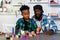 Loving Father Teaches and Plays with Son at Home for Learning and Education on Counting Cube in Math and Skill Development. Father