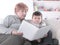 Loving grandmother reads a book to her grandson.photo with copy space