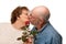 Loving Senior Husband Giving Red Rose to Wife