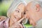 Loving Senior Woman Touching Man\'s Nose