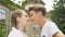 Loving teen couple nuzzling, first love, couple looking at each other, emotions