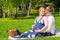 Loving young couple expecting a baby, rest on a picnic