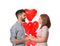 Loving young couple with heart-shaped balloons on white background. Celebration of Saint Valentine\'s Day