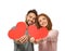 Loving young couple with paper red hearts on white background. Celebration of Saint Valentine\'s Day
