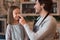 Loving Young Dad Playing With His Little Daughter In Kitchen, Fooling Together