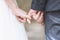 Loving Young love married couple holding hands and stand together in ceremony wedding day