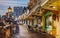 The low afternoon sun illuminates the cafes and restaurants along the West Cliff arcade on a quiet but sunny Christmas Eve