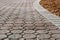 Low angle brick paver driveway