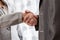 Low angle closeup view of a business handshake