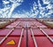 Low angle of container stack inside container yard. Container port terminal operations.