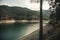 Low-angle of Cuifeng lake view with forested mountains and sunlit sky background