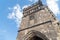 Low angle detail historic Charles Bridge tower gate, Gothic architecture