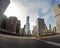 Low angle fish-eye shot of high skyscrapers in downtown Chicago under the breathtaking cloudy sky