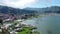 Low angle flying above traditional fish cage farm in beautiful Lake Batur, Bali, Indonesia. Aquaculture and food